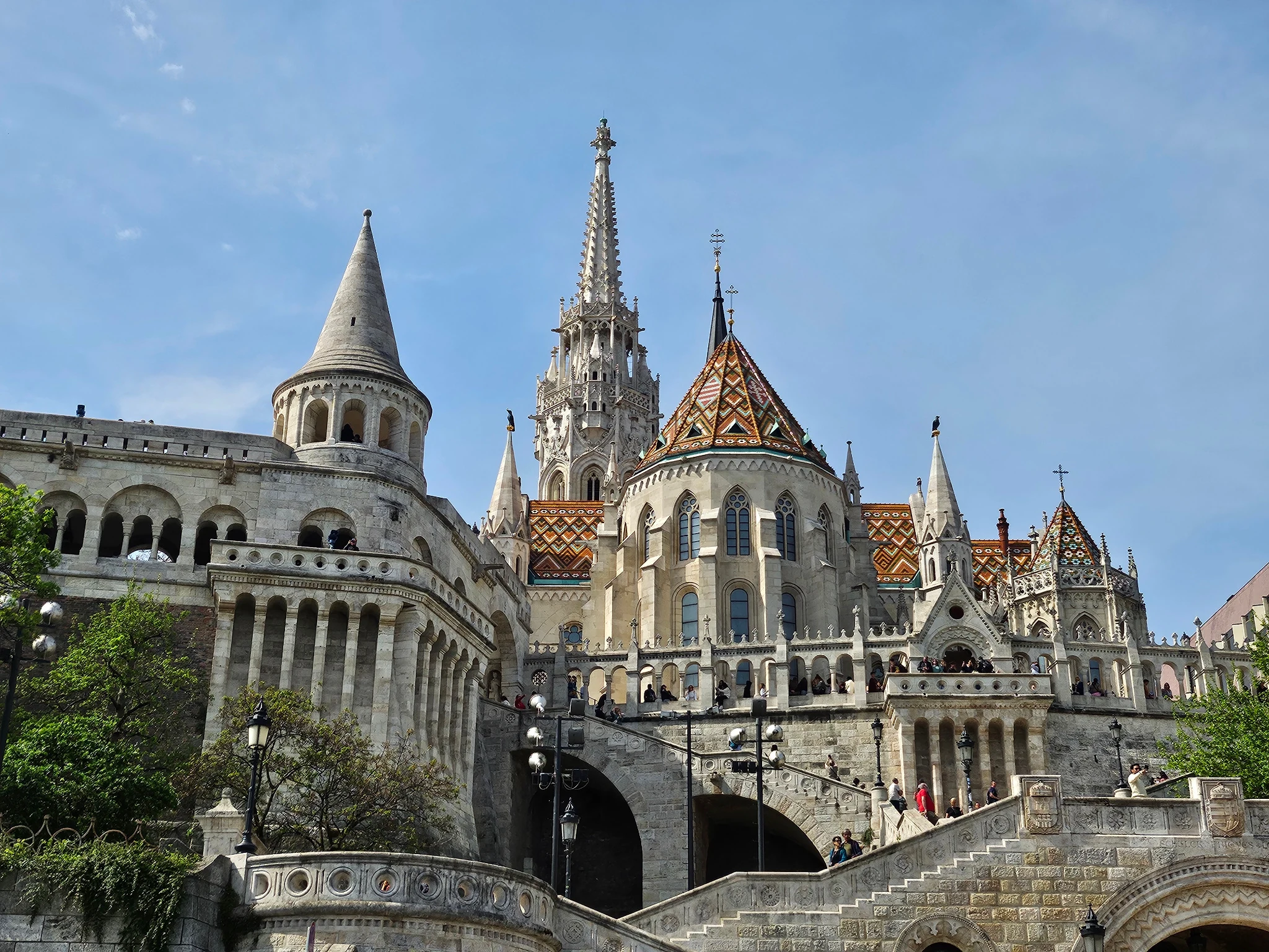 Fisherman’s Bastion beside the patterned roof and spire of Matthias Church.