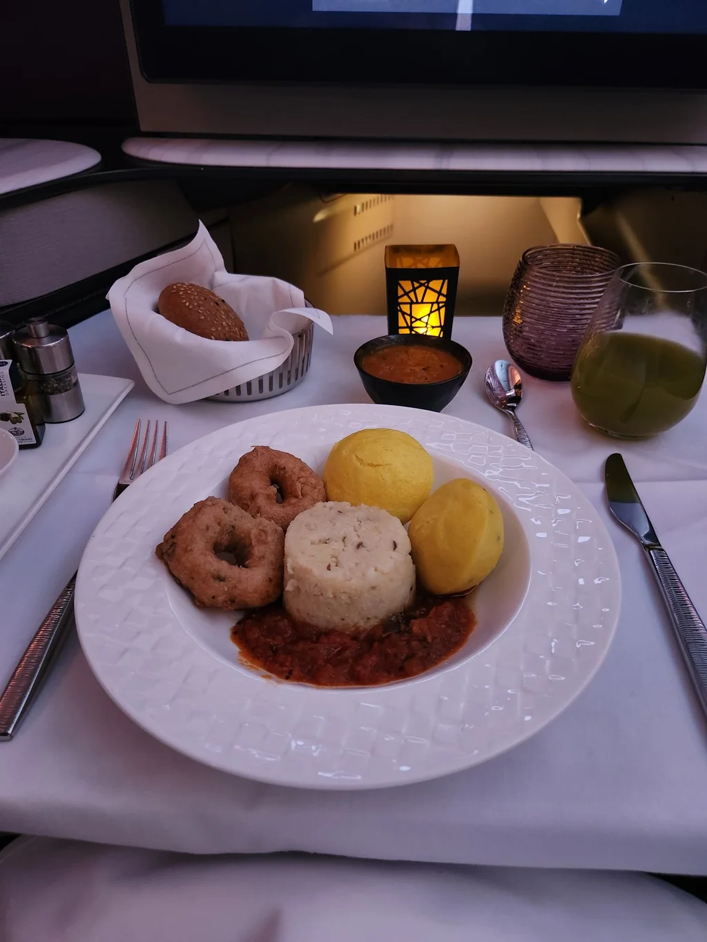 Tray meal served on the short Dubai-to-Doha Qatar Airways First Class flight in November 2023.