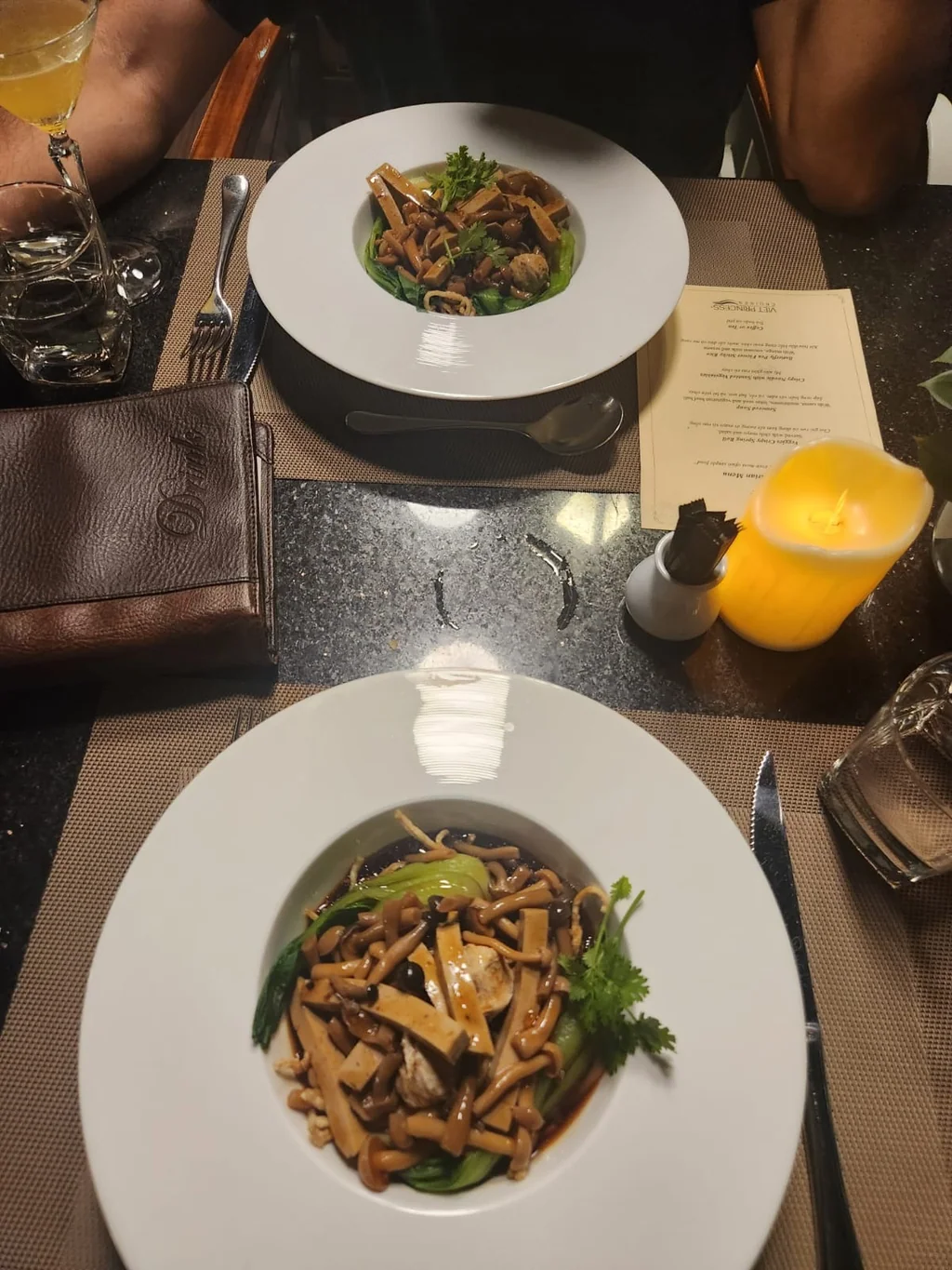 Plated vegetarian dishes during a Saigon Princess river dinner cruise.